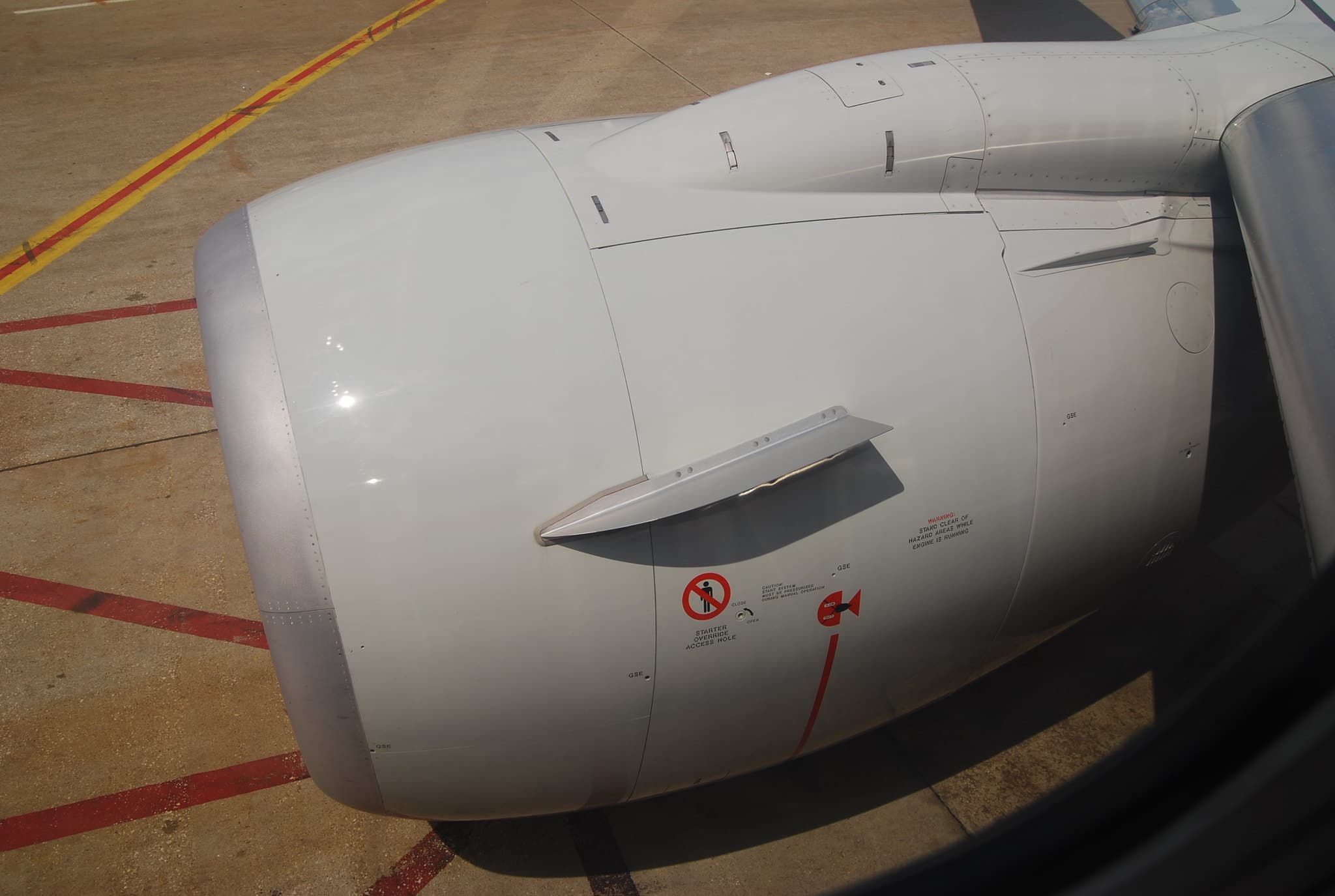 Engine Blade Shatters Ryanair Window, Partially Pulling Passenger From Plane